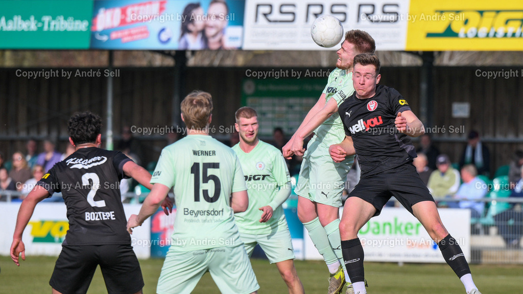 PSV Neumünster vs FC Kilia Kiel | Meiko Werner (PSV #15) &amp; Calvin Ehlert (PSV #31) vs Devran Boztepe (Kilia #2) &amp; Marc Schwabe (Kilia #17) / Fußball-Oberliga Männer 2025/2026 / PSV Neumünster vs FC Kilia Kiel / PSV Stadion Platz A / Neumünster / 07.03.26 - Realisiert mit Pictrs.com