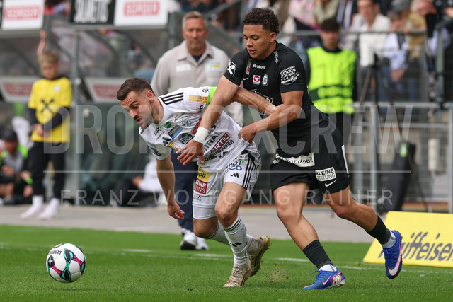 SK Puntigamer Sturm Graz vs TSV Egger Glas Hartberg – Championship Group    | Graz, Austria, 12.Apr.26 - SOCCER - ADMIRAL Bundesliga, SK Puntigamer Sturm Graz vs TSV Egger Glas Hartberg. The image shows Juergen Heil (Hartberg) and Jacob Peter Hoedl (STU).    