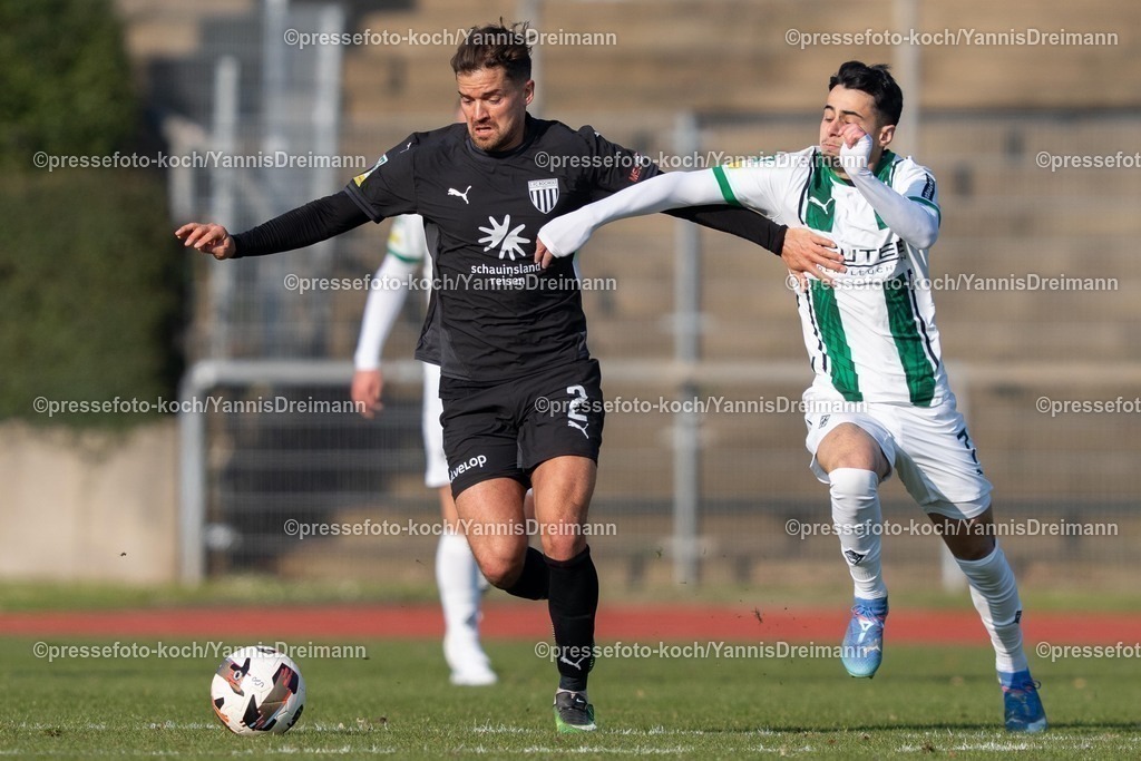 xYDR15032501100 | 15.03.2025, xydrx, Fußball, Borussia Mönchengladbach II (U23) - 1.FC Bocholt, Regionalliga West, Grenzlandstadion: Julian Riedel (1. FC Bocholt #2) im Zweikampf gegen  Ismail Harnafi (Borussia Moenchengladbach II #7)