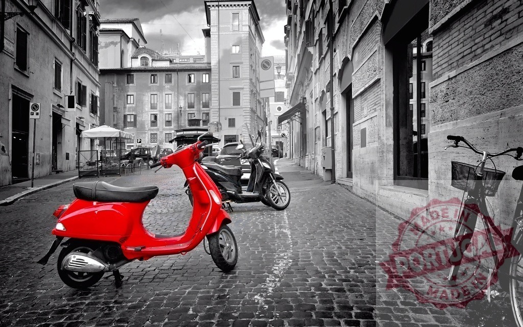 Red scooter parked on a Rome cobblestone street | Red Vespa scooter standing out on a black and white cobblestone street in Rome - Realisiert mit Pictrs.com