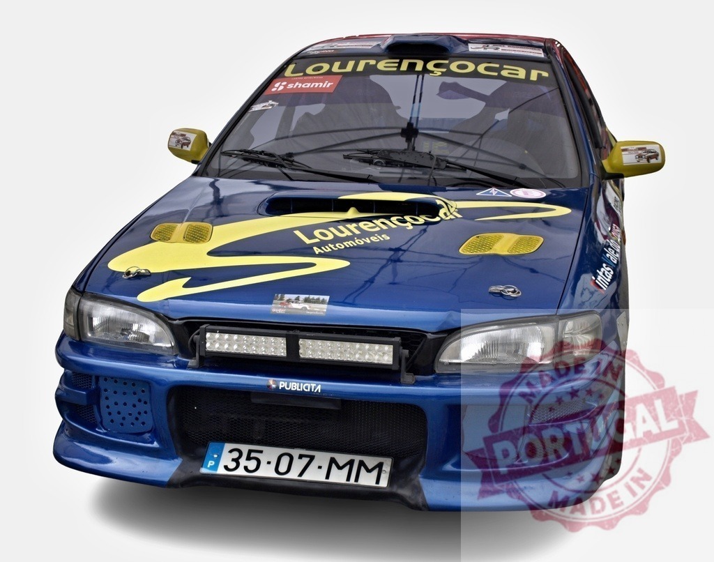 Subaru impreza wrx sti showcasing racing livery at car show | Blue subaru impreza wrx sti with yellow racing livery, additional lights and modified bodykit, parked at a car show - Realized with Pictrs.com
