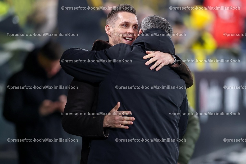 BVB13022601023 | 13.02.2026, Fußball, Borussia Dortmund - 1.FSV Mainz 05,, 1. Fußball Bundesliga, 22. Spieltag, Signal Iduna Park, Saison 2025 2026: Sportdirektor Sebastian Kehl (BVB #sk) neben Meikel Schönweitz (Technischer Direktor Mainz)  DFB regulations prohibit any use of photographs as image sequences and or quasi-video.