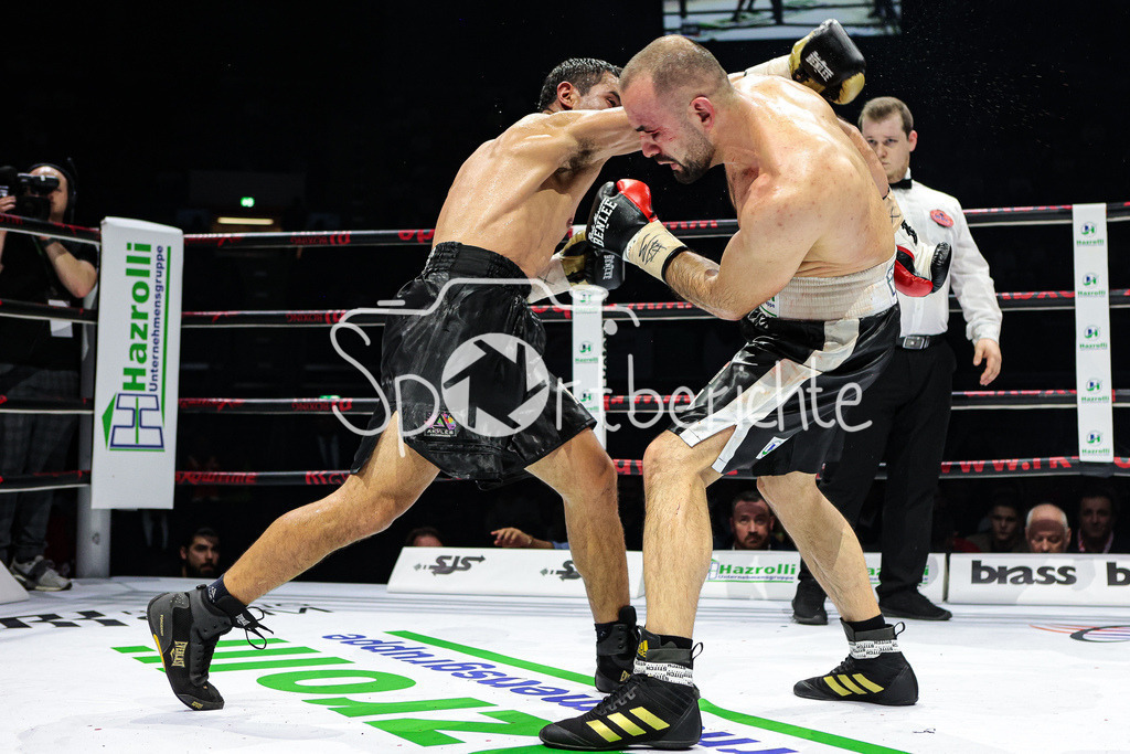 Profi - Box - Gala / Main Event | Shefat ISUFI (Schwarz Weisse Hose) im WBF Titelkampf gegen Hernan David PEREZ (Schwarze Hose)