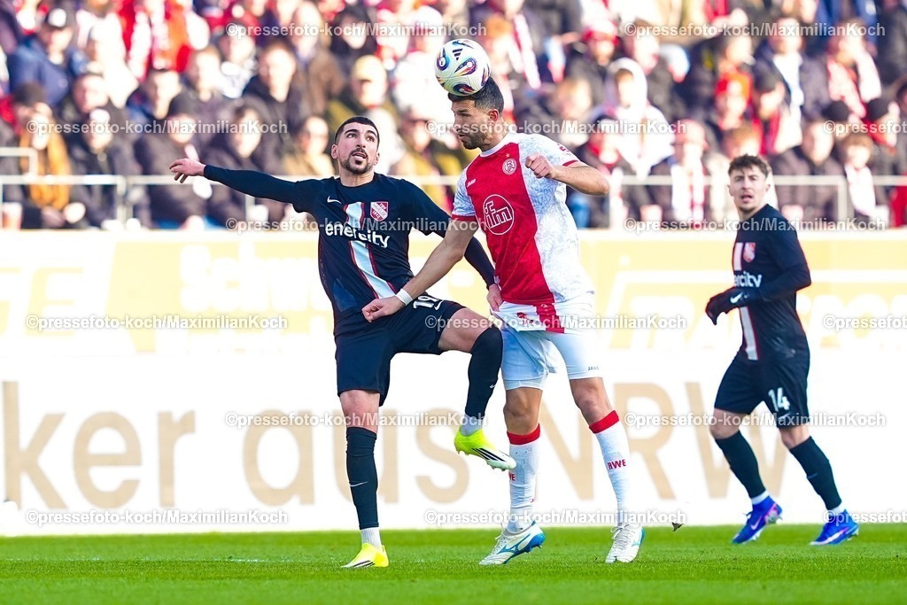 xYDRx24012601020 | 24.01.2026, xydrx, Fußball, 3.Liga, Rot-Weiss Essen - TSV Havelse, Saison 2025 2026, Stadion an der Hafenstraße: Nassim Boujellab (TSV Havelse #19) im Zweikampf gegen Klaus Gjasula (Rot-Weiss Essen #8)   DFB regulations prohibit any use of photographs as image sequences and or quasi-video. Photo: xYannisxDreimannxPressefotoKochx