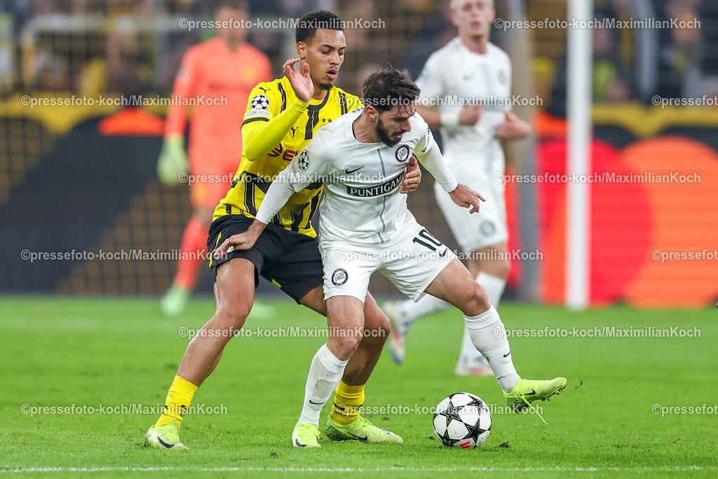 BVB05112401028 | 05.11.2024, Fußball, UEFA Champions League, Borussia Dortmund - SK Sturm Graz, 4. Spieltag, Signal Iduna Park, Saison 2024 2025: Felix Nmecha (BVB #8) gegen Otar Kiteishvili (Graz #10)