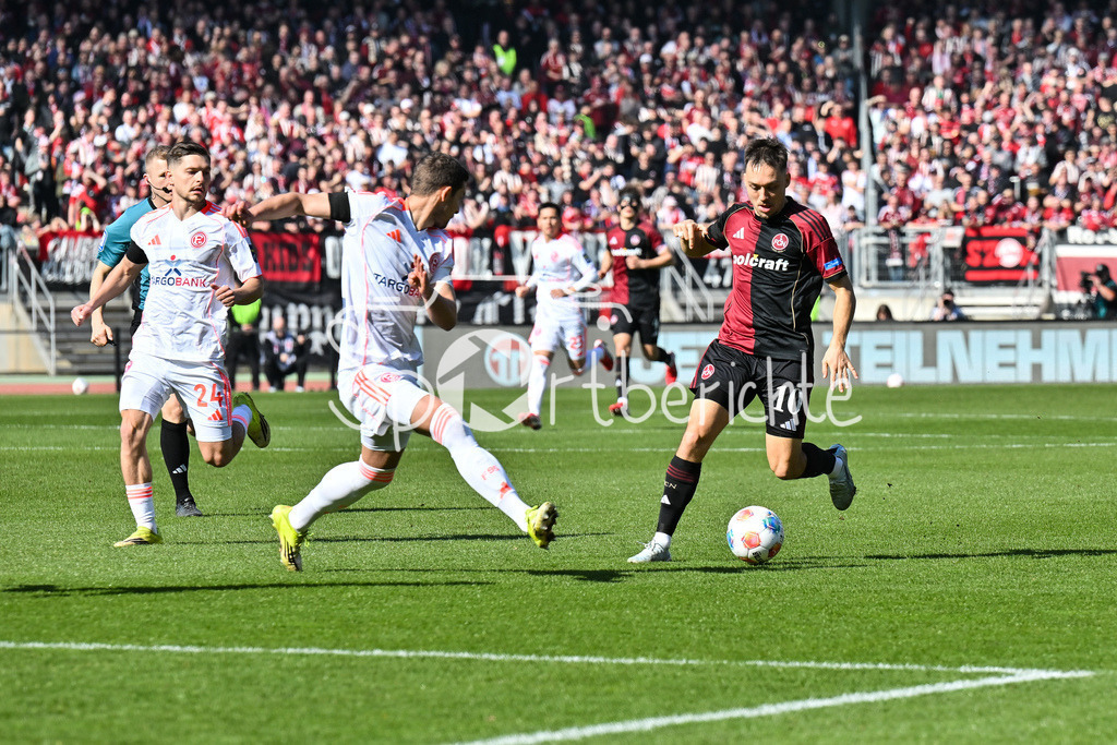 1. FC Nürnberg - Fortuna Düsseldorf | NUREMBERG, GERMANY - 07. MARCH:  im Duell Tim OBERDORF (Fortuna Düsseldorf 15) und Julian JUSTVAN (1. FC Nuernberg 10) während dem Match zwischen dem 1. FC Nürnberg und Fortuna Düsseldorf am 25. Spieltag der 2. Bundesliga im Max Morlock Stadion