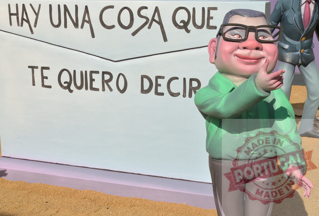 Jorge Javier Vázquez caricature at Las Fallas Valencia Spain. Fallas Fiestas Communidad Valenciana | Caricature sculpture of Jorge Javier Vázquez pointing at a message in Las Fallas festival - Realized with Pictrs.com