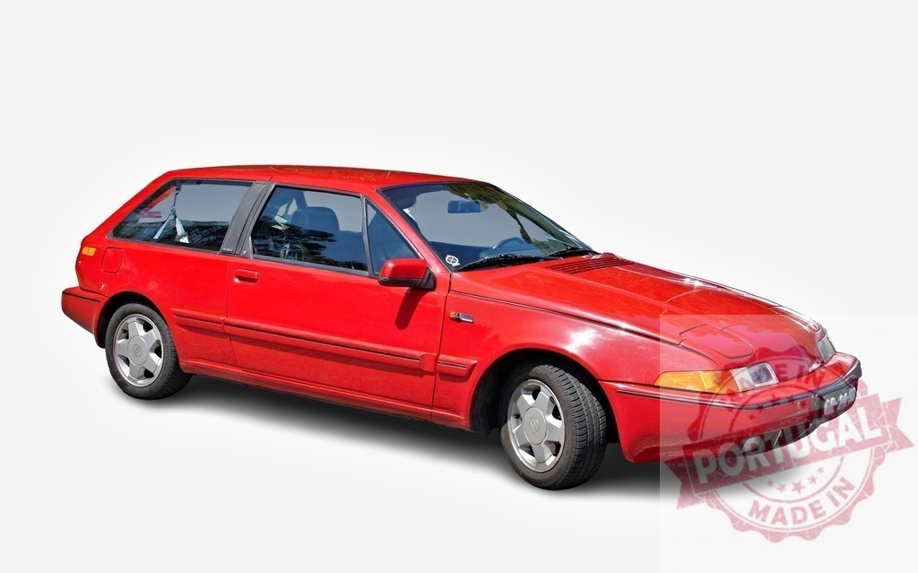 Red Volvo 480 ES sports coupe posing on a white background | Shiny red Volvo 480 ES sports coupe standing out against a white background - Realized with Pictrs.com