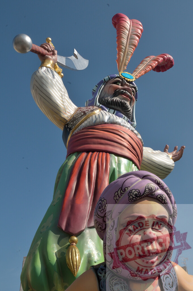 Las Fallas festival sculpture displaying a warrior and child. Fallas Fiestas Communidad Valenciana | Elaborate papier-mâché sculpture of a warrior and child celebrating Las Fallas in Valencia - Realized with Pictrs.com