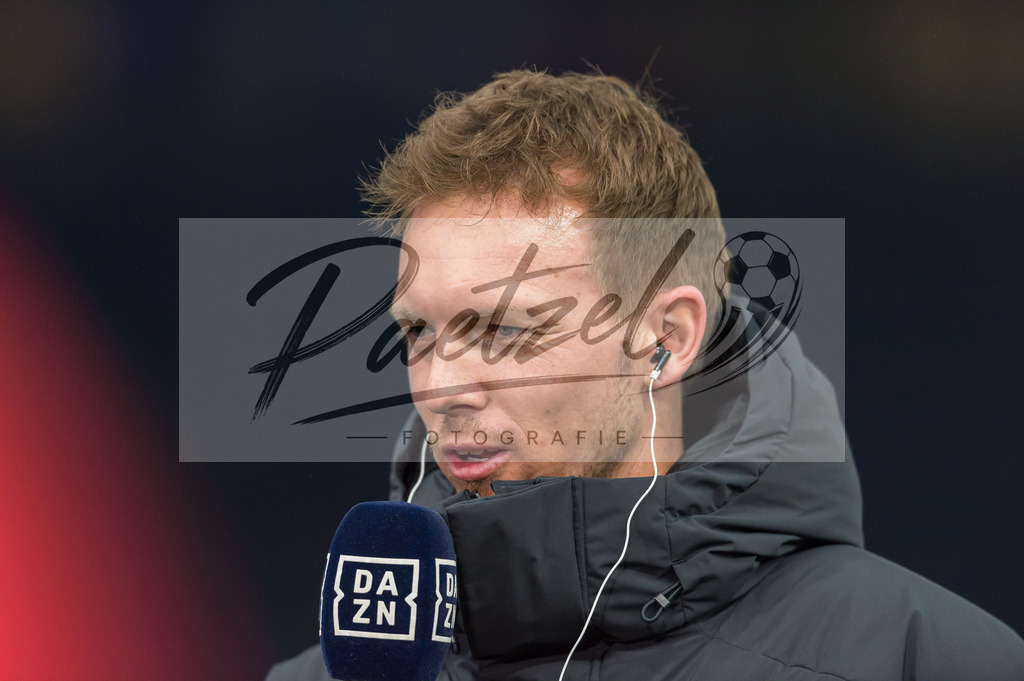 BSCFCB20220123_177 | Fussball, Herren: Trainer Julian Nagelsmann (FC Bayern Muenchen) im Interview bei dem Spiel der 1. Bundesliga zwischen Hertha BSC und FC Bayern Muenchen im Olypiastadion am 23.01.2022 in Berlin, Deutschland.DFB / DFL REGULATIONS PROHIBIT ANY USE OF PHOTOGRAPHS AS IMAGE SEQUENCES AND/OR QUASI-VIDEO. - Realisiert mit Pictrs.com