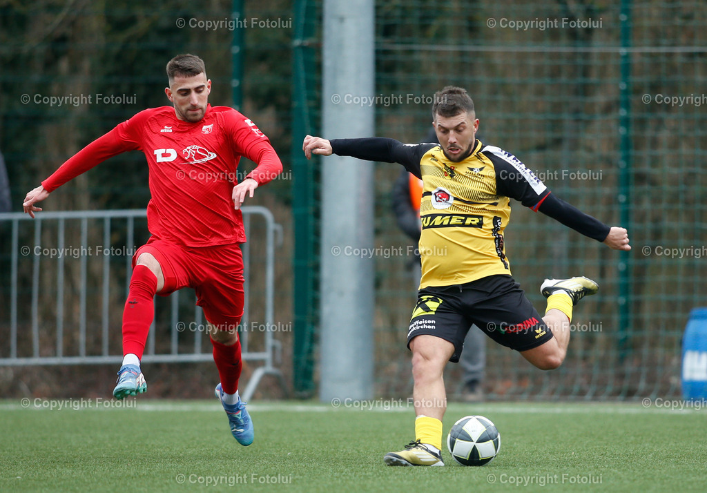 A_LUI_15032025_06 | SPORT FUSSBALL LL.OST E ASKOE OEDT 1B -GUNSKIRCHEN 15.03.IM BILD : JOVAN PETROVIC (OEDT1B) UND DIBRAN RRAHMAI (GUNSKIRCHEN)FOTO:OEDT