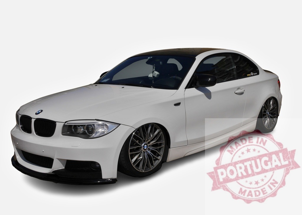 White BMW 1 Series Coupe is parked, showing tuning and customization | Customized white BMW 1 Series Coupe exuding style and performance upgrades - Realized with Pictrs.com