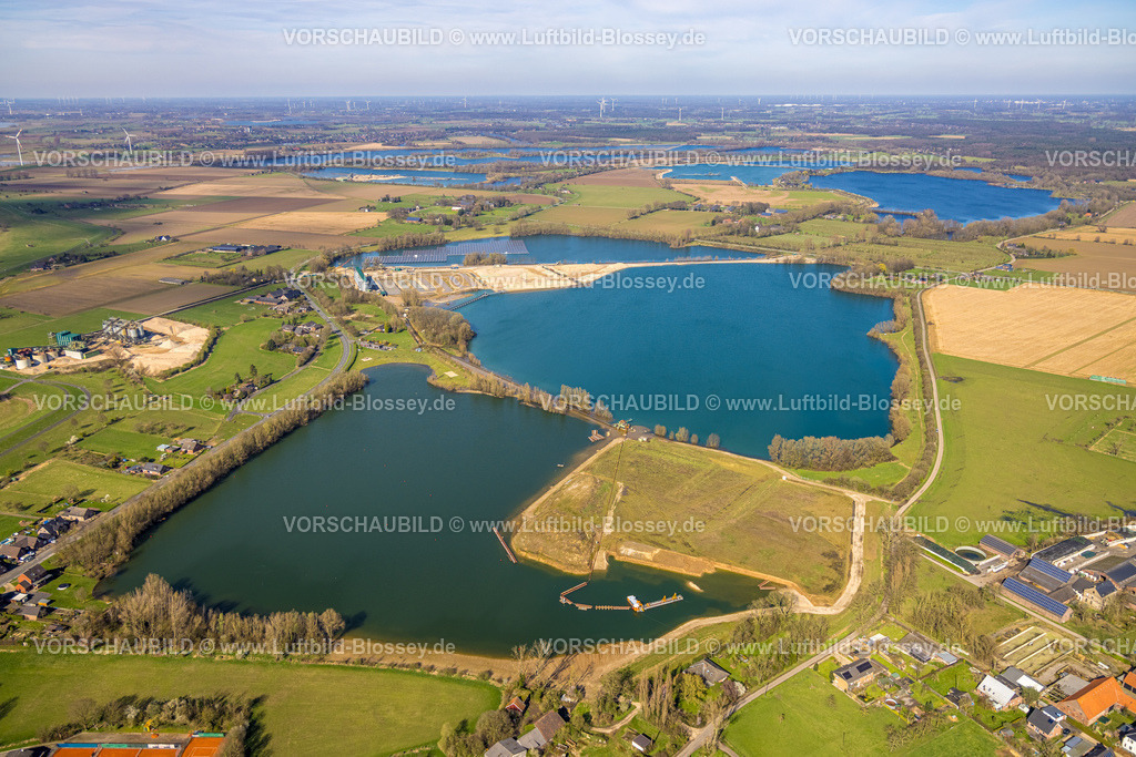 Rees240311950 | Luftbild, Seenplatte mit Wiesen und Feldern und blauem Himmel mit Wolken, See an der Böckersche Straße, Bislich, Wesel, Nordrhein-Westfalen, Deutschland
