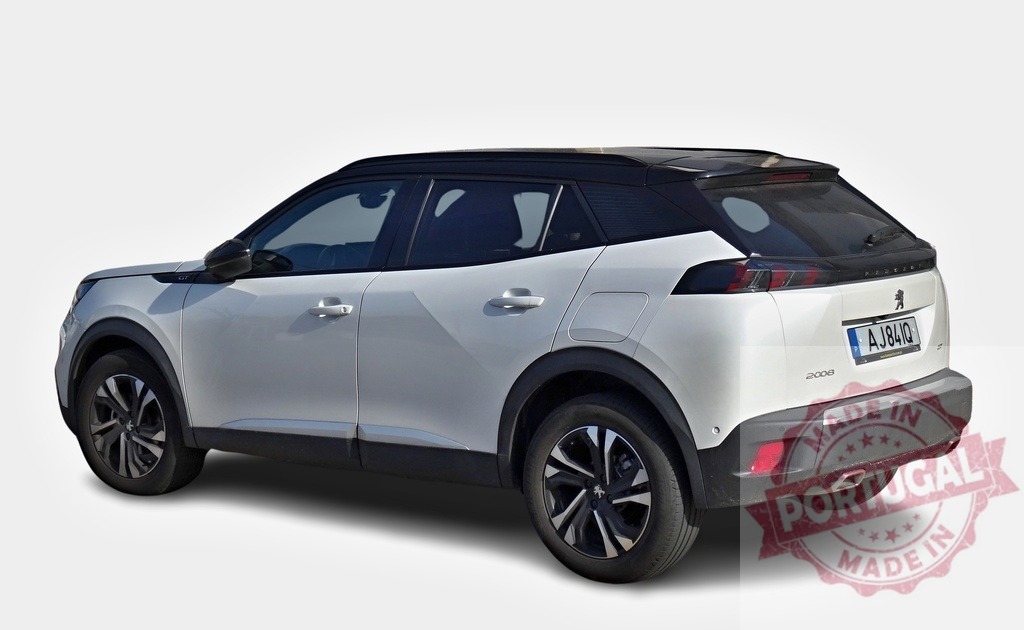 White Peugeot 2008 SUV crossover car parked on white background | Modern white Peugeot 2008 SUV crossover car parked on a white background, showcasing its sleek design and contemporary features - Realized with Pictrs.com