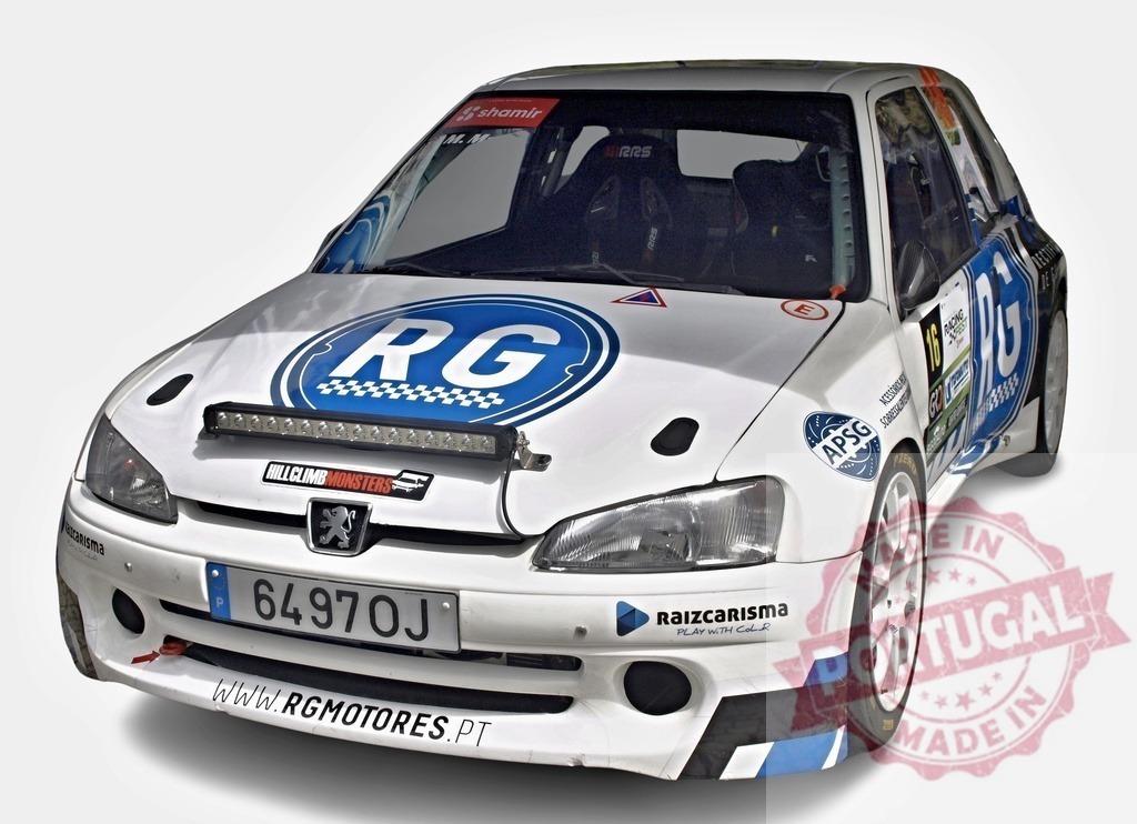 Peugeot 106 rally car waiting at the start line | White and blue peugeot 106 rally car waiting at the starting line of a rally competition - Realized with Pictrs.com