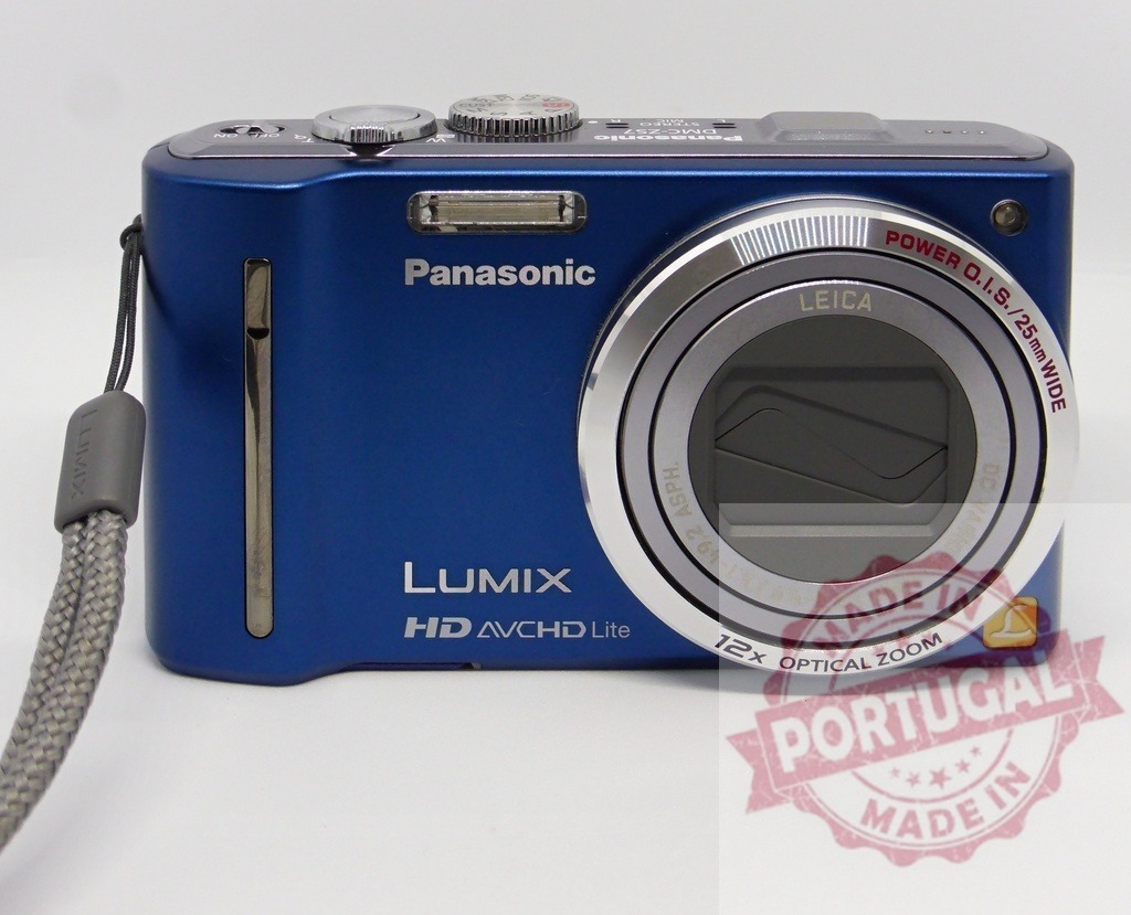 Panasonic Lumix digital camera with Leica optical zoom | Blue Panasonic Lumix point-and-shoot digital camera on a white background - Realized with Pictrs.com