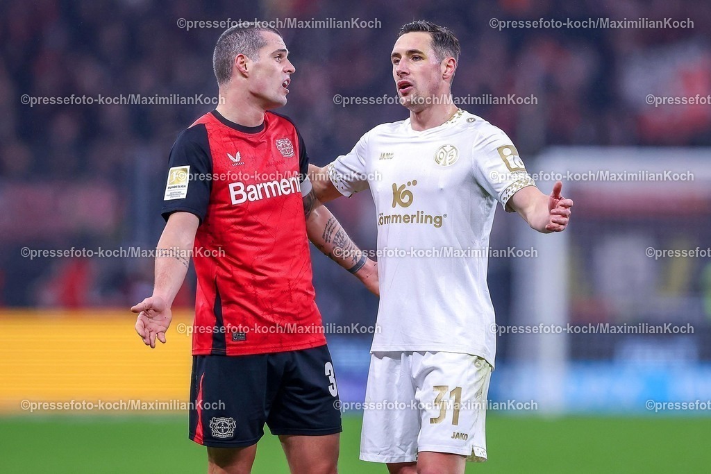 Lev14012501065 | 14.01.2025, Fußball, Bayer 04 Leverkusen - 1. FSV Mainz 05, 1. Fußball Bundesliga, 17. Spieltag, BayArena, Saison 2024 2025: Granit Xhaka (Bayer04 Leverkusen #34) neben Dominik Kohr (Mainz #31)DFB regulations prohibit any use of photographs as image sequences and or quasi-video.