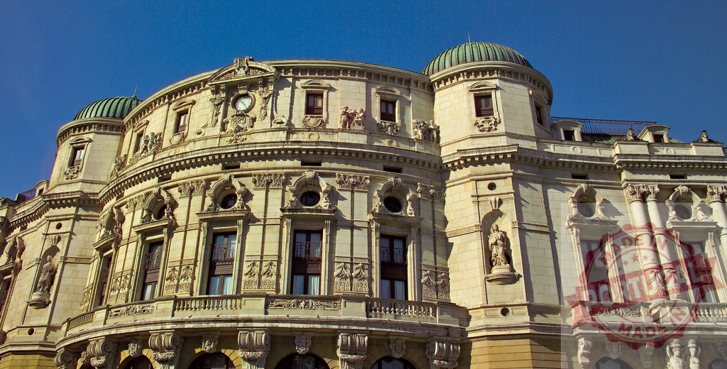 Arriaga Theatre building facade with Neo-Baroque architecture. Spain - Bilbao | Arriaga Theatre standing as a historic landmark in Bilbao, showcasing its detailed Neo-Baroque facade - Realisiert mit Pictrs.com