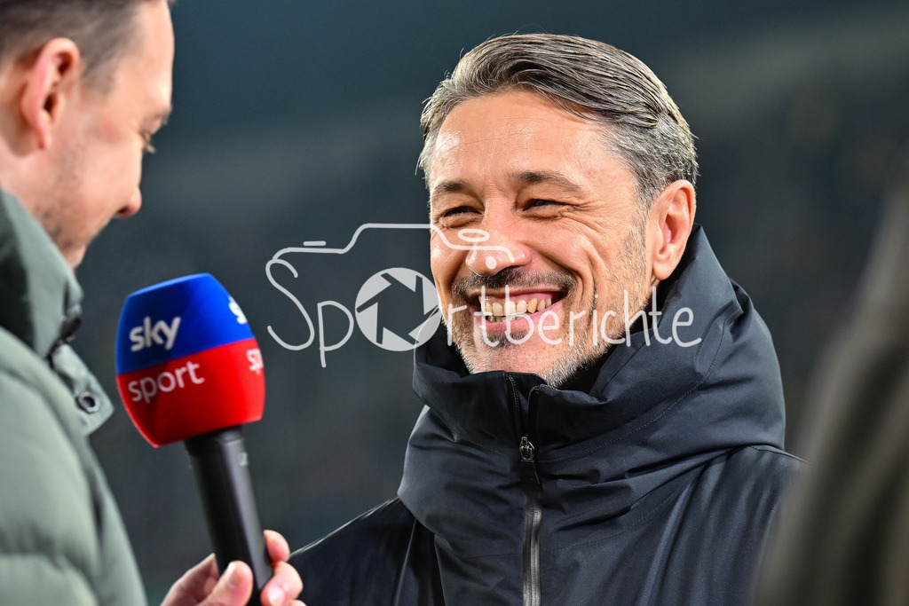 FC Augsburg - Borussia Dortmund | AUGSBURG, GERMANY - OCTOBER 31: Niko KOVAC headcoach Borussia Dortmund, interview, sky, happy, before the bundesliga match between FC Augsburg vs. Borussia Dortmund on matchday 9 at WWK Arena on October 31, 2025 in Augsburg, Germany / DFL REGULATIONS PROHIBIT ANY USE OF PHOTOGRAPHS AS IMAGE SEQUENCES AND/OR QUASI-VIDEO