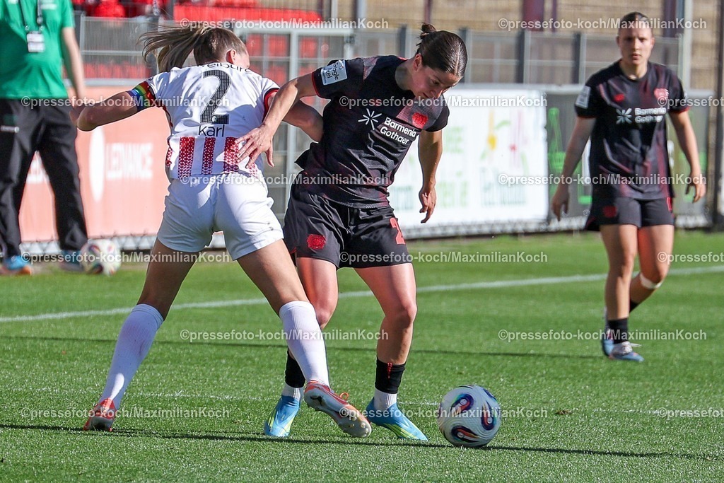 xsscx26042601022 | 26.04.2026, xsscx, Frauen Fussball, Bayer 04 Leverkusen - SC Freiburg, 1. Fussball Bundesliga, 23. Spieltag, Ulrich-Haberland-Stadion, Saison 2025 2026: Lisa Karl (SC Freiburg #02) im Zweikampf gegen Ruby Grant (Bayer Leverkusen #22) DFB regulations prohibit any use of photographs as image sequences and or quasi-video. Photo: xSandraxScherningxPressefotoKochx