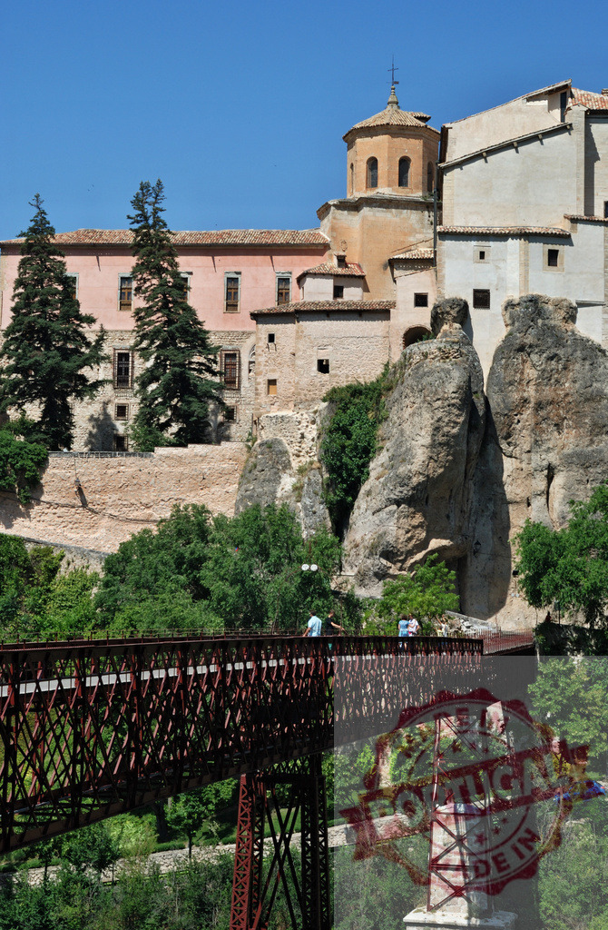 San Pablo Bridge connecting old town Cuenca architecture. Cuenca - Spain | San Pablo Bridge spanning a gorge, connecting the historic city of Cuenca's Casas Colgadas - Realized with Pictrs.com