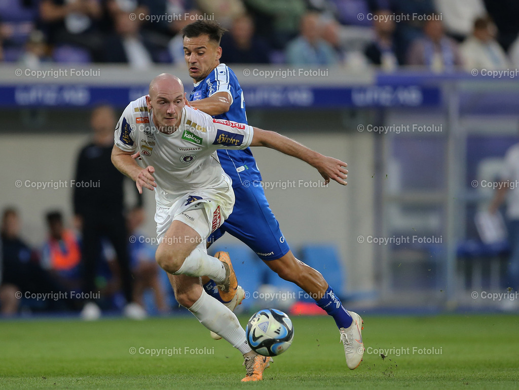 A_LUI_300923_06 | SPORT,FUSSBALL,ADMIRAL BUNDESLIGA BLAU WEISS LINZ-AUSTRIA KLAGENFURT 30.09.2023 IM BILD: KRISTIJAN DOBRAS (BLAUWEISSLINZ) UND NICOLAS WIMMER (KLAGENFURT) FOTO:FOTOLUI