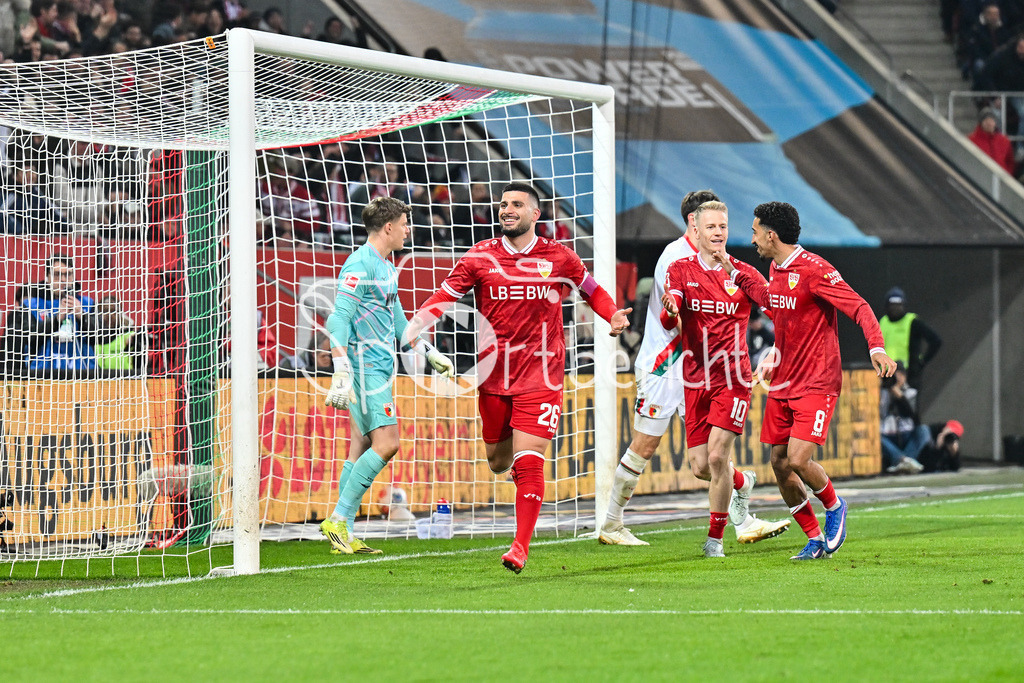 FC Augsburg - VfB Stuttgart | AUGSBURG, GERMANY - 22. MAERZ: Jubel der Gäste nach dem Treffer zum 1-4 durch Deniz UNDAV (VfB Stuttgart 26) / Tor / Torschuetze / Freude / Happy während dem Bundesligamatch zwischen dem FC Augsburg und dem VfB Stuttgart am 27. Spieltag in der WWK Arena / DFL REGULATIONS PROHIBIT ANY USE OF PHOTOGRAPHS AS IMAGE SEQUENCES AND/OR QUASI-VIDEO