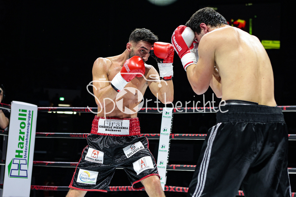Profi - Box - Gala / Main Event | Kushtrim TAHIRUKAJ (rot schwarze Hose) in seinem Kampf gegen Nika GAVAJAVA (schwarze Hose)