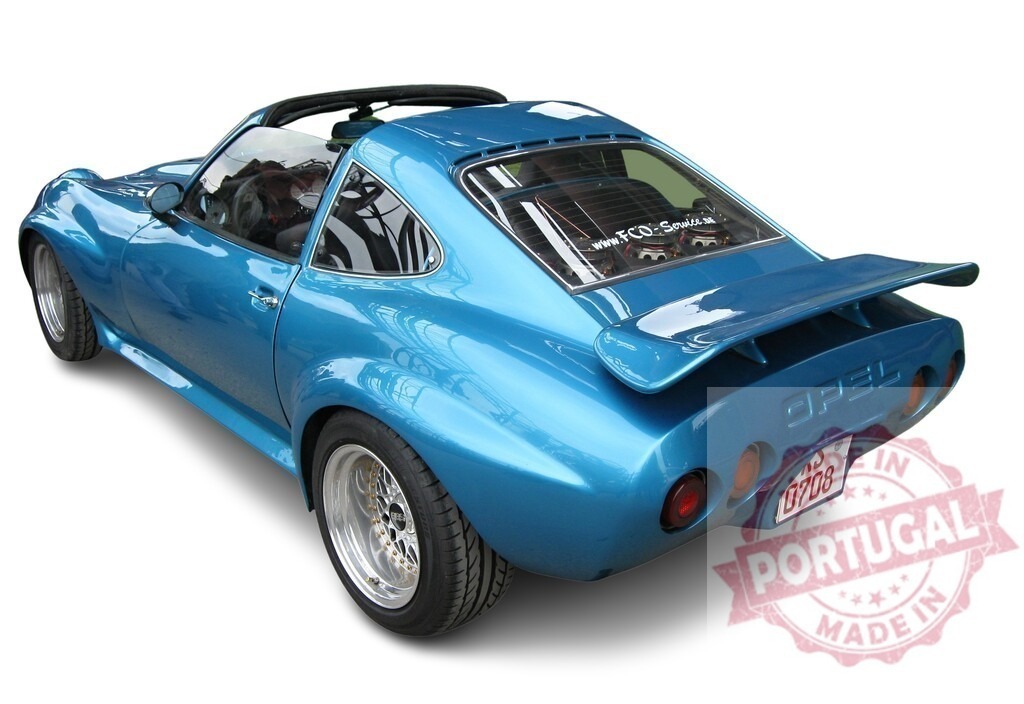 Customized Opel GT sports car showing its rear and open roof | Tuned Opel GT posing with open roof and custom rear spoiler and lights - Realisiert mit Pictrs.com