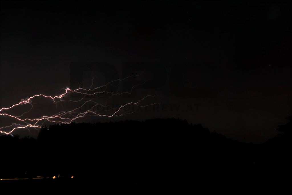 Lightning Storm over the Almenland | Multiple lightning strikes illuminate the night sky over the Almenland region in Austria during a powerful summer thunderstorm. - Realisiert mit Pictrs.com