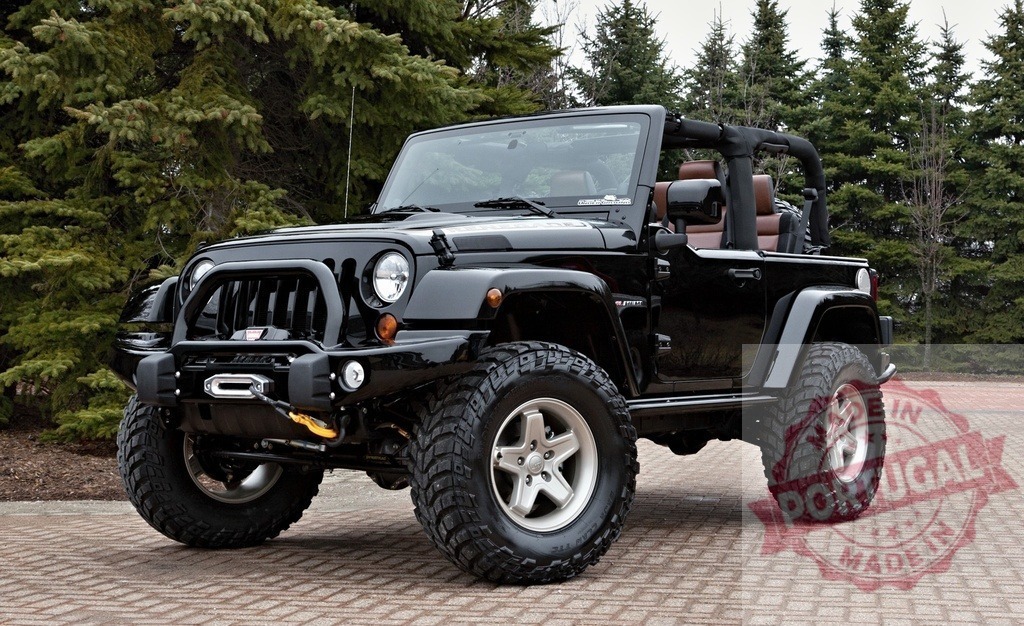 Black Jeep Wrangler off-road vehicle parking outdoors | Black Jeep Wrangler SUV, a powerful 4x4 convertible car ready for adventure on paved ground - Realized with Pictrs.com