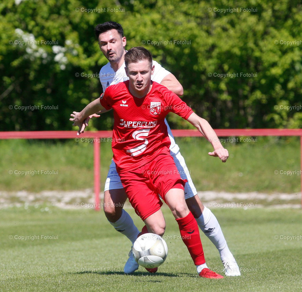 A_LUI_27042024_31 | SPORT,FUSSBALL,LT1 OOE LIGA ASKOE OEDT-UNION EDELWEISS LINZ 27.04.2024 IM BILD:PETER ALEXANDER  (OEDT) UND SIMON KANDLER (EDELWEISS) FOTO:FOTOLUI