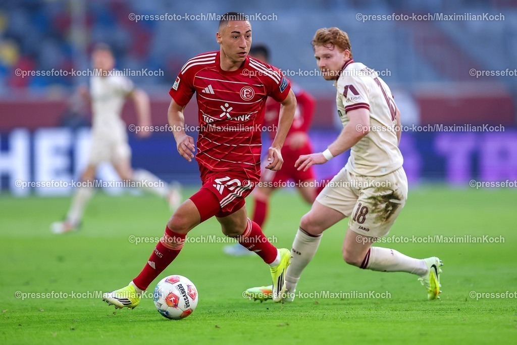 F9524042601034 | 24.04.2026, Fußball, Fortuna Düsseldorf - SC Dynamo Dresden, 2. Fußball Bundesliga, Herren, Merkur Spiel-Arena, 31. Spieltag, Saison 2025 2026: Marin Ljubicic&nbsp;(Fortuna Düsseldorf #20) im Zweikampf gegen  Robert Wagner (Dynamo Dresden #19)  DFB regulations prohibit any use of photographs as image sequences and or quasi-video.