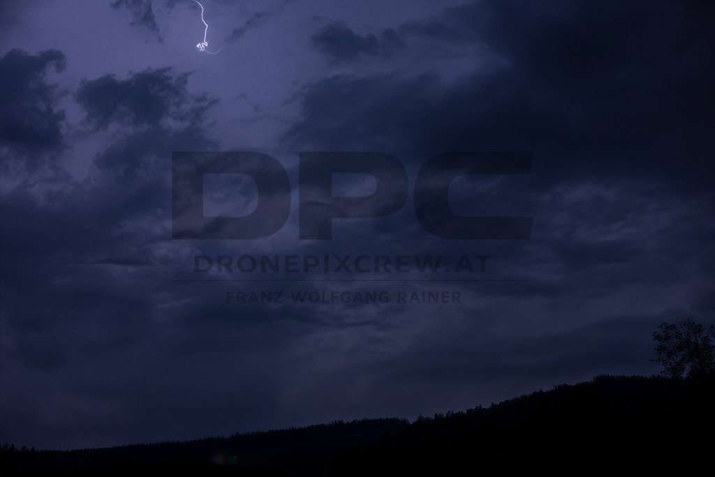 Lightning Storm over the Almenland | Multiple lightning strikes illuminate the night sky over the Almenland region in Austria during a powerful summer thunderstorm. - Realisiert mit Pictrs.com