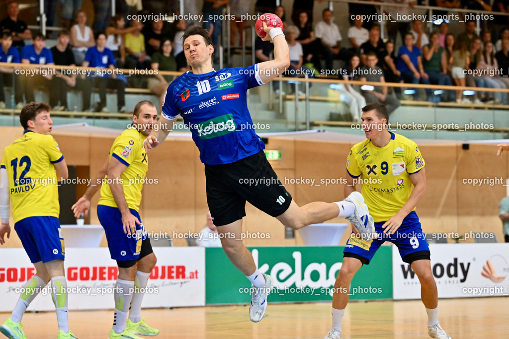 SC Ferlach vs. UHC Hollabrunn | #12 PAVLOV Hari UHC Hollabrunn, #22 SAFRANKO Rudolf UHC Hollabrunn, #10 Perkusic Toni SC Ferlach, #9 SIMIC Ante UHC Hollabrunn, SC Ferlach vs. UHC Hollabrunn, SC Ferlach vs. UHC Hollabrunn am 20.09.2025 in Ferlach (Ballspielhalle Ferlach), Austria, (Photo by Bernd Stefan)