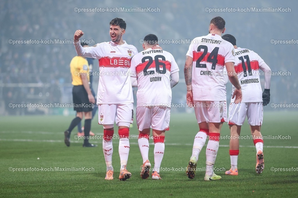 BOC03122501060 | 03.12.2025, Fußball, DFB-Pokal, VfL Bochum - VfB Stuttgart, Achtelfinale, Vonovia Ruhrstadion, Saison 2025 2026: Torjubel nach dem Tor zum 2:0 durch Torschütze Deniz Undav  (VfB Stuttgart #26)  zusammen mit Atakan Karazor  (VfB Stuttgart #16)  DFB regulations prohibit any use of photographs as image sequences and or quasi-video.