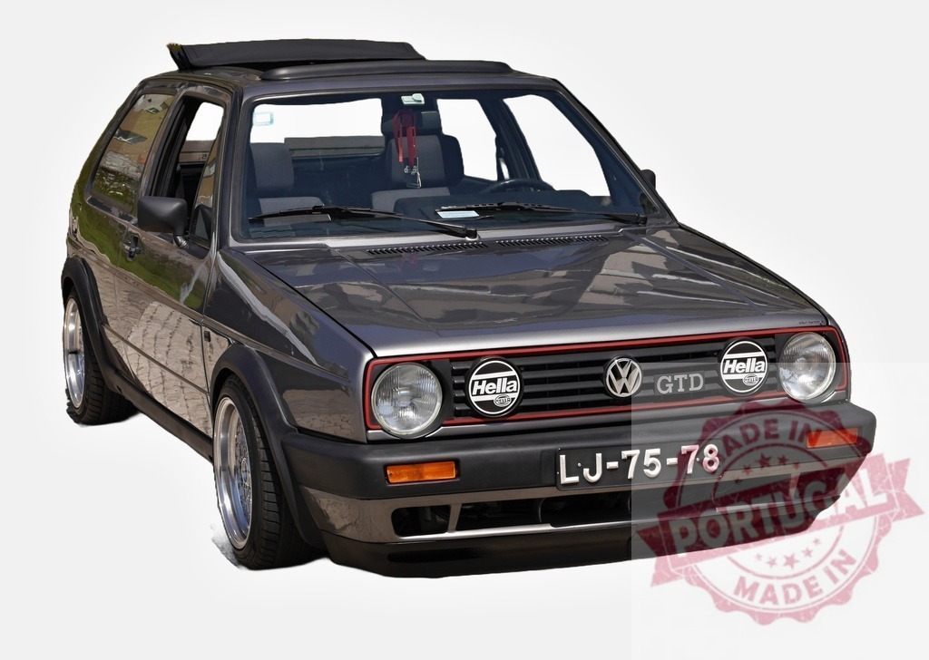 Customized Volkswagen Golf GTD showing tuning and customization | Tuned Volkswagen Golf GTD with custom Hella lights, alloy rims and sunroof, parked and showing tuning and customization - Realized with Pictrs.com