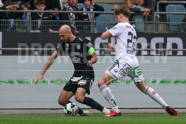 SK Puntigamer Sturm Graz vs TSV Egger Glas Hartberg – Championship Group    | Graz, Austria, 12.Apr.26 - SOCCER - ADMIRAL Bundesliga, SK Puntigamer Sturm Graz vs TSV Egger Glas Hartberg. The image shows Jon Gorenc Stankovic (STU) and Marco Hoffmann (Hartberg).    