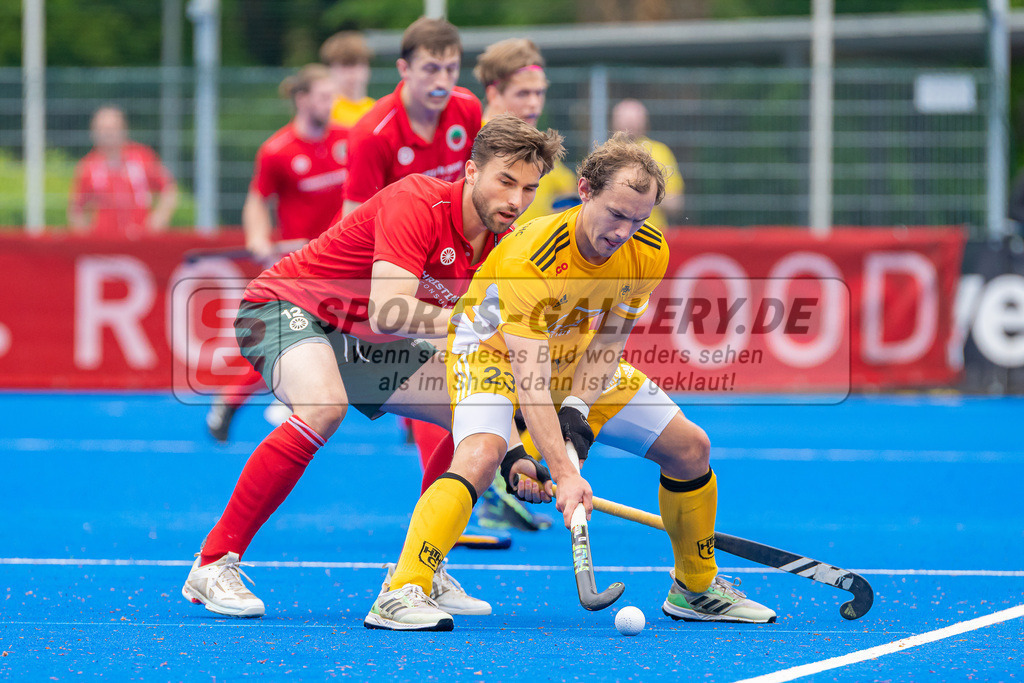HK_20230507_107926 | 1. Bundesliaga Herren Creefelder HTC - Harvestehuder THC  am 7.5.2023 Crefelder HTC ( CHTC ), Krefeld  , Jansen Phillip ( Crefelder HTC #12 ) , Spooner Nicholas ( Harvestehuder THC #23 )