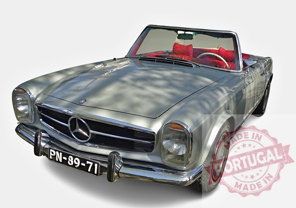 Mercedes-Benz 280 SL Pagoda classic car parked with red leather interior and top down | Classic Mercedes-Benz 280 SL parked, showing its iconic design and red leather interior - Realized with Pictrs.com
