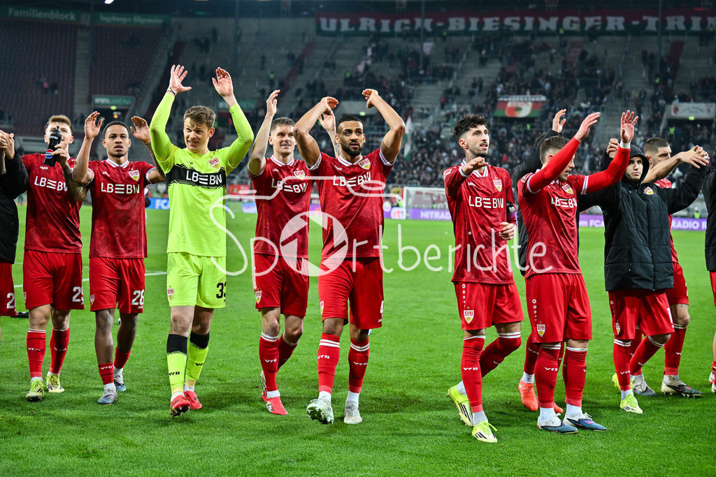FC Augsburg - VfB Stuttgart | AUGSBURG, GERMANY - 22. MAERZ: die Spieler der Gäste feiern zusammen mit den Fans den Auswärtssieg in Sutttgart nach dem Bundesligamatch zwischen dem FC Augsburg und dem VfB Stuttgart am 27. Spieltag in der WWK Arena / DFL REGULATIONS PROHIBIT ANY USE OF PHOTOGRAPHS AS IMAGE SEQUENCES AND/OR QUASI-VIDEO