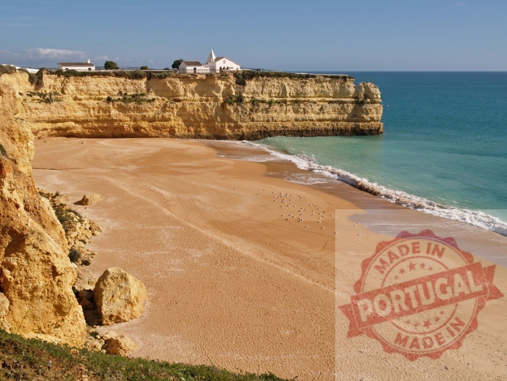 Nossa Senhora da Rocha chapel overlooking Praia Nova in Algarve | Coastal landscape with a sandy beach and a white chapel on a cliff - Realized with Pictrs.com
