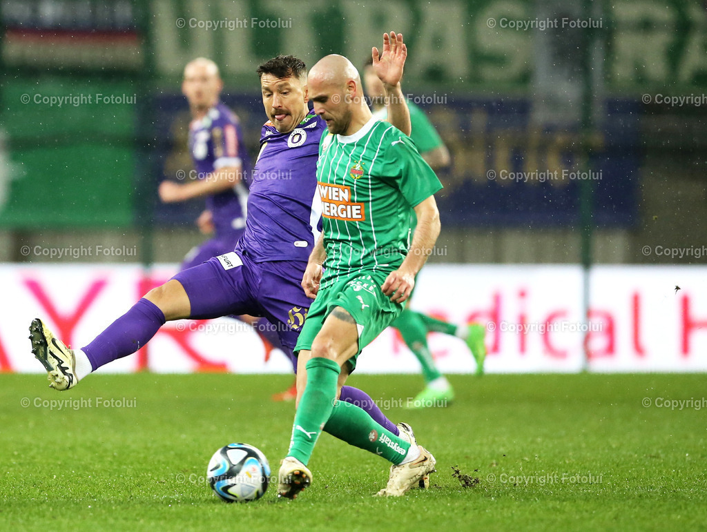 A_LUI_10032024_07 | SPORT,FUSSBALL, ADMIRAL BUNDESLIGA AUSTRIA KLAGENFURT-SK RAPID WIEN 10.03.2024 IM BILD: CHRISTOPHER WERNITZING (KLAGENFURT) UND LUKAS GRGIC (RAPID WIEN) FOTO:FOTOLUI/MW