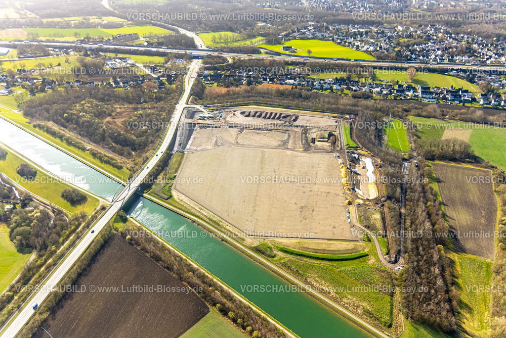 Waltrop260305265 | Luftbild, Neuansiedlung Gewerbegebiet Im Dicken Dören, Revitalisierung ehemalige Bergehalde, Mengeder Straße mit Brücke über den Dortmund-Ems-Kanal, hinten die Atobahn A2 und Anschlussstelle Dortmund-Mengede, Waltrop, Ruhrgebiet, Nordrhein-Westfalen, Deutschland