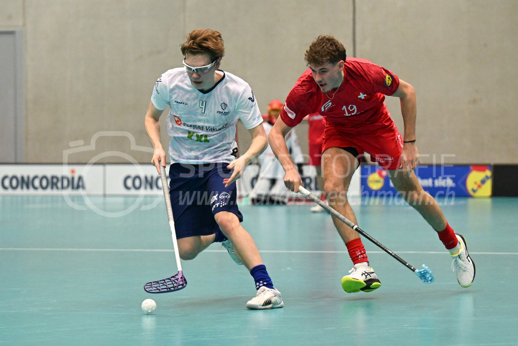 Switzerland B U19 vs Finland U19 - 2. February 2024 | Switzerland B U19 vs Finland U19
U19 Men International Matches in Switzerland
GoEasy Arena, Siggenthal Station
Finland defender #4 Leo Tiittala in front of Switzerland forward #19 Noël Greber.
Credit: Markus Aeschimann | <a href="https://www.markus-aeschimann.ch">Sportfotografie Markus Aeschimann</a> | <a href="https://www.instagram.com/sportfotografie.aeschimann">@sportfotografie.aeschimann</a> - Realisiert mit Pictrs.com