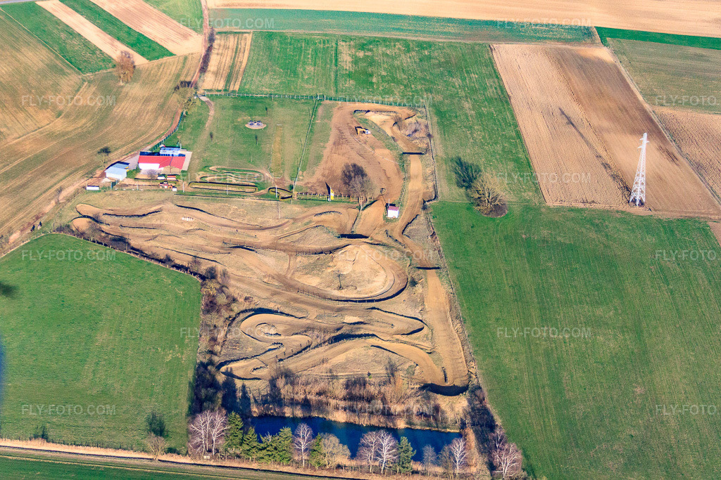 Aerial view: Terrain de Moto-Cross de Riedseltz in Drachenbronn-Birlenbach in the state Bas-Rhin, France.Photo: IMG_38769.jpg taken on 03/20/2011 by Werner Riehm/FLY-FOTO.comResolution of the original: 4008 x 2672 px