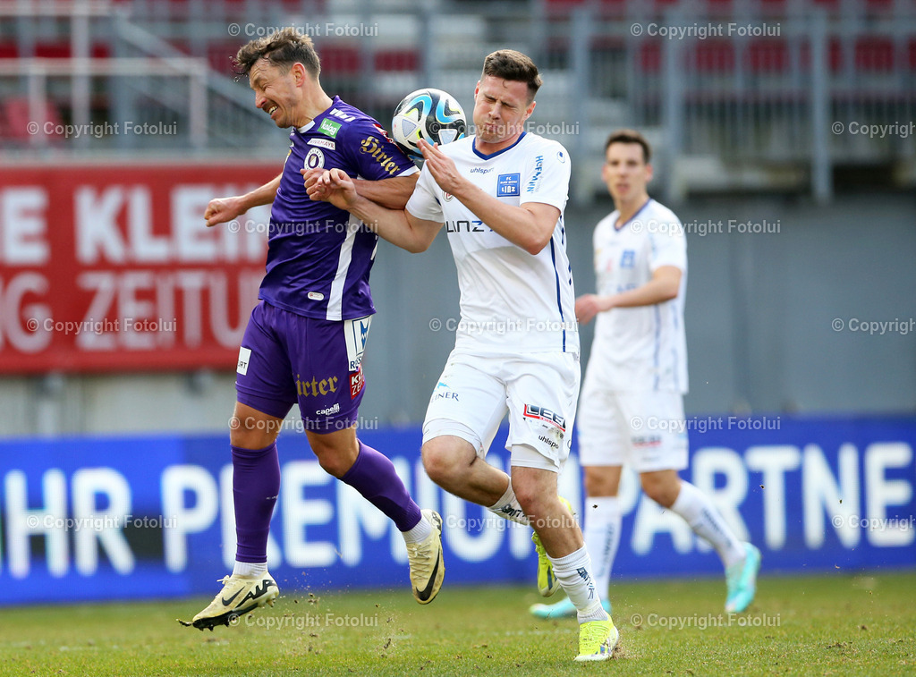 A_LUI_25022024_15 | SPORT,FUSSBALL, ADMIRAL BUNDESLIGA AUSTRIA KLAGENFURT - BLAU WEISS LINZ 25.02.2024 IM BILD :CHRISTOPHER WERNITZING (KLAGENFURT) UND STEFAN FEIERTAG (BLAUWEISSLINZ) FOTO:FOTOLUIMW