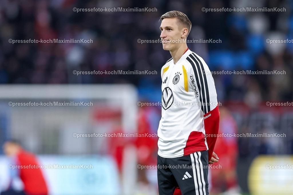 DFB14112501048 | 14.11.2025, Fußball, Länderspiel, WM-Qualifikation Europa, Deutschland - Luxemburg, Stade de Luxembourg (Croix de Gasperich, Luxemburg), 9. Spieltag, Saison 2025 2026: Nico Schlotterbeck (GER #15)  Regulations prohibit any use of photographs as image sequences and or quasi-video.