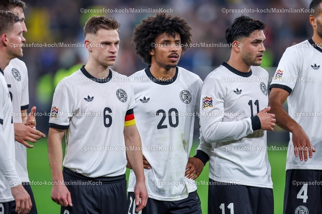 DFB23032502235 | 23.03.2025, Fußball, Viertelfinale UEFA Nations League, Deutschland - Italien, Signal Iduna Park, Saison 2024 2025: Joshua Kimmich (GER #06) Karim Adeyemi (GER #20) Nadiem Amiri (GER #11)DFB regulations prohibit any use of photographs as image sequences and or quasi-video.