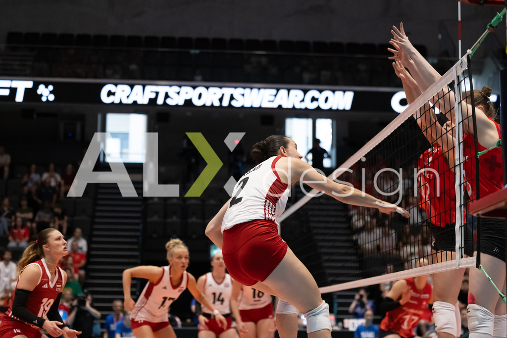 Austria v Switzerland - CEV European League Women | KRIENS, SWITZERLAND - JUNE 14: CARMEN RAAB of Austria attack / spike against FABIANA BRANCA and MERET AARDEN of Switzerland in double block during the CEV European League match between Austria and Switzerland at Pilatus Arena on June 14, 2026 in Kriens, Switzerland. - Realisiert mit Pictrs.com